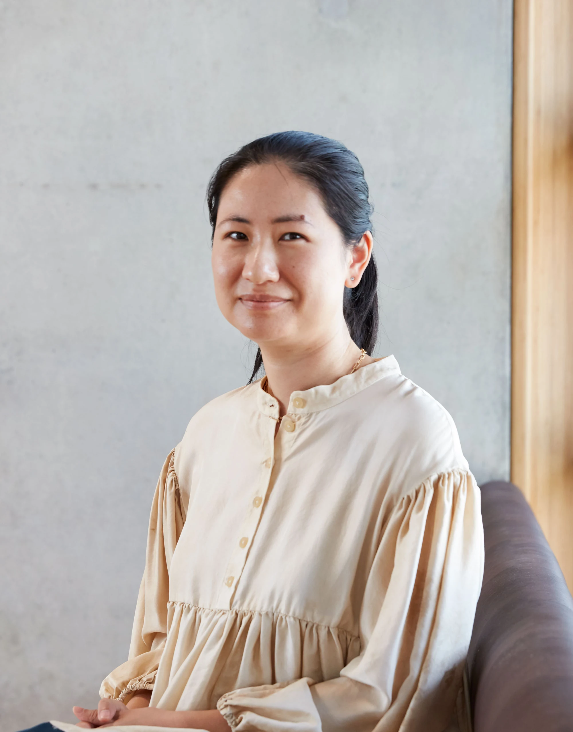 Portrait of M+ associate curator Kate Gu